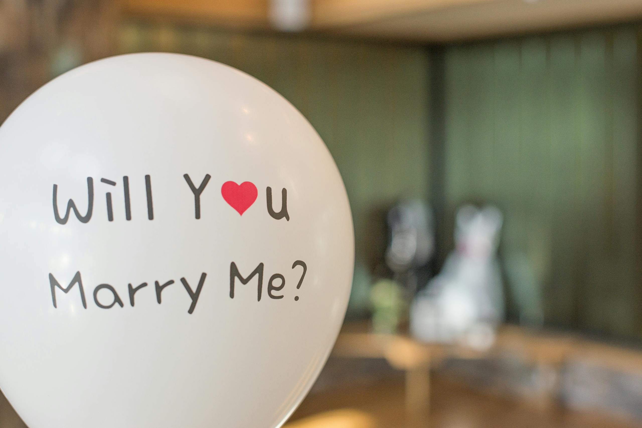 A romantic balloon with 'Will You Marry Me?' for a heartfelt marriage proposal.